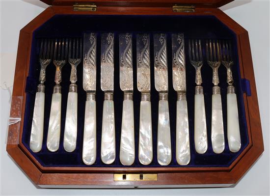 Six pairs of mother of pearl-handled fruit eaters, cased